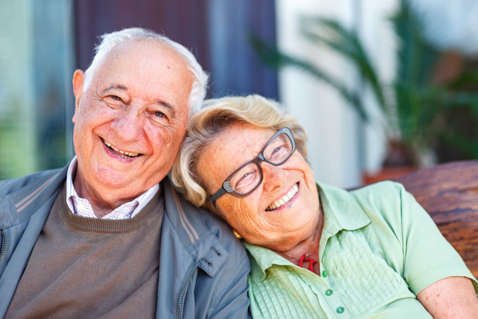 Elderly couple laughing